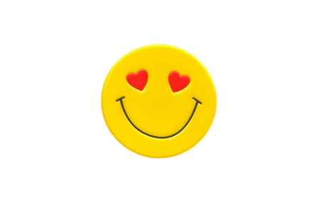 Stock Photo - Bright, yellow sticker with a smiley face