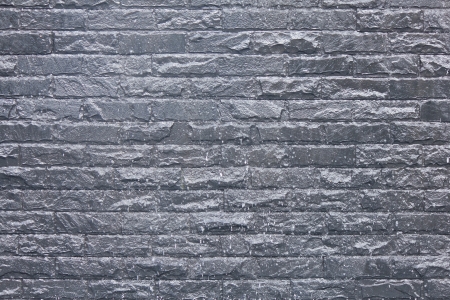 Stock Photo - Dark stone tile texture brick wall surfacedの写真素材