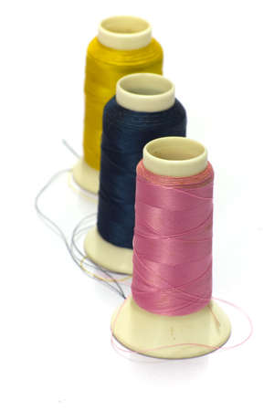 Stock Photo - Thread bobbin isolated on white background
