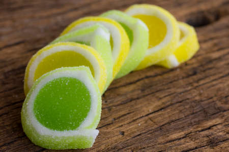 Stock Photo - Colorful candy on a wood background の写真素材