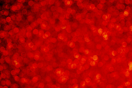 Defocused abstract red christmas background stock photoの写真素材