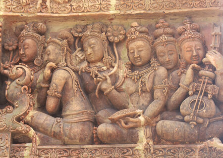 Details of sandstone carving on the wall of Angkor wat 