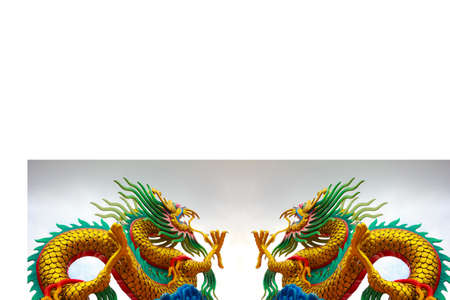 Twin Chinese style dragon statues with abstract backgroundの写真素材