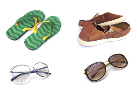 Sunglasses ,slippers and old red sneakers on white Stock Photoの写真素材