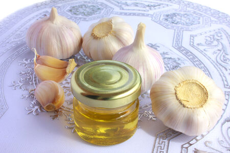 garlic and jar of honey - Stock Imageの写真素材