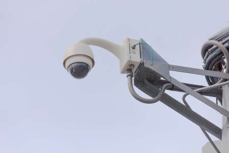 High tech overhead security camera at a government owned building.の写真素材
