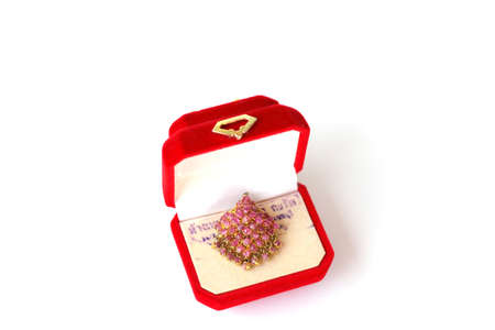 crafted ethnic earrings made with metal and violet crystals isolated on white backgroundの写真素材