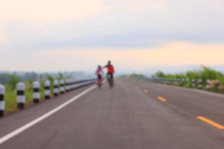 Family cycling outdoorsの写真素材