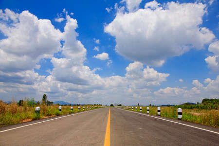 Road and cloud on blue sky background