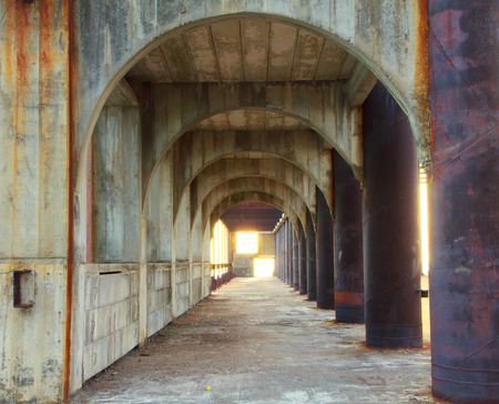 corridor of concrete pillars with perspective depthの写真素材