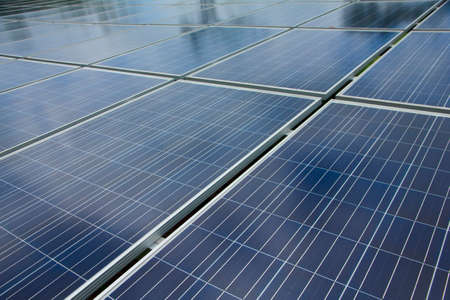 Reflexion of the clouds on the photovoltaic modulesの写真素材