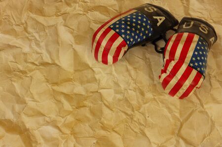 Pair of usa boxing gloves on the old vintage paper textureの写真素材