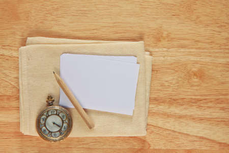 New pattern paper page and vintage watch with pencil.の写真素材