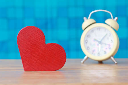 Hearts on a wooden table and backgroundの写真素材