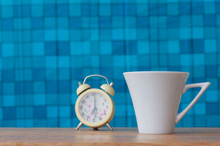 Coffee cup on wooden table - Vintage effect style picturesの写真素材