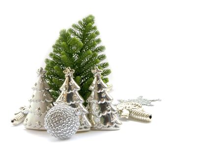 Christmas gifts and decoration on shiny silver backgroundの写真素材