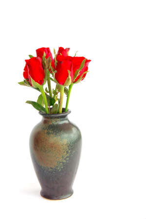 red roses in  vase isolated on white backgroundの写真素材