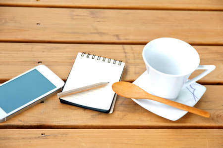 empty cup of coffee on table in cafe, vintage styleの写真素材