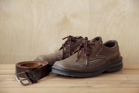 stylish leather men's dress shoes and beltの写真素材