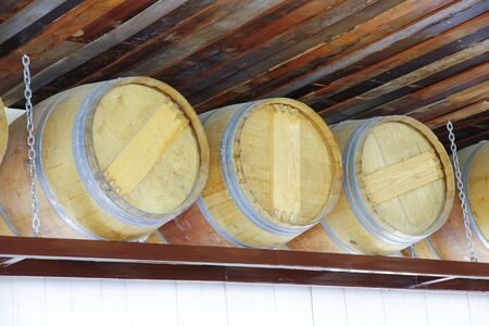 Close up of wooden wine barrel in wine cellar