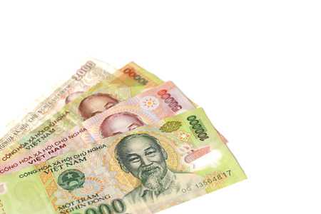 Vietnamese money (Dong),vietnam money on white wooden backgroundの写真素材