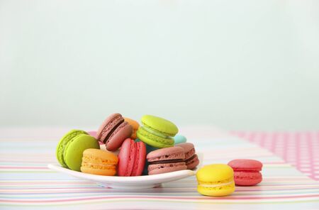 Sweet and colourful french macaroons on retro-vintage backgroundの写真素材