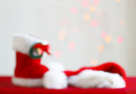 Blurred christmas decorations on a blurred lights backgroundの写真素材