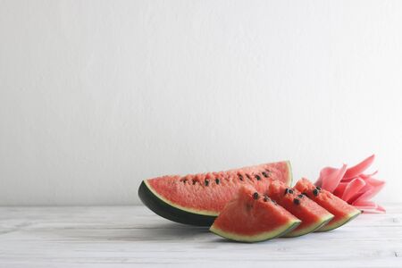 Fresh sliced watermelon wooden backgroundの写真素材