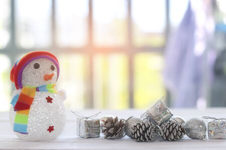 Snowman stand  hopefulness and happiness in Merry christmas and new yearの写真素材