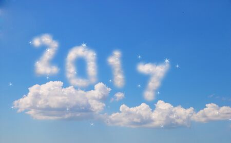 concept of 2017 clouds on the clear blue sky