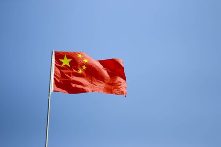 flag of China waving with highly detailed textile textureの写真素材