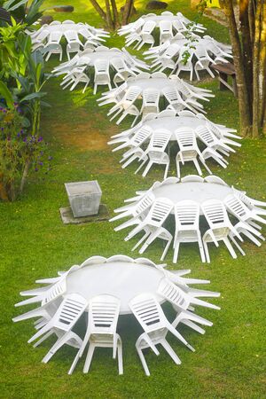Plastic chairs and tables at fast food restaurant