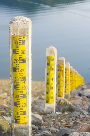water level meter showing low levels after a period of droughtの写真素材