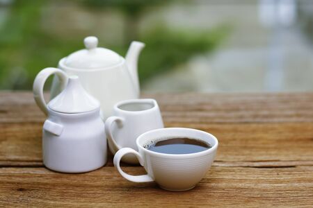 Fresh coffee with milk in cup with close up. Selective focusの写真素材