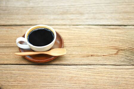 coffee cup in the morning on wooden backgroundの写真素材