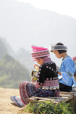 Back view of young girl hmong hill tribe in beautiful costume dress in Thailand.のeditorial素材