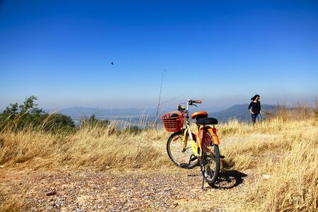 Freedom and travel concept. A Mountain Bike standing with beautiful viewの写真素材