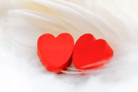 Two red hearts on white background, soft focus. Romantic card. Declaration of love in vintage...