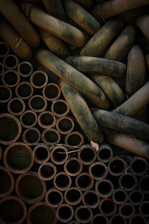 Dark Wall Earthen Elements Associated Cement Mortar Background.Modern Wall Texture Detail.Layered...