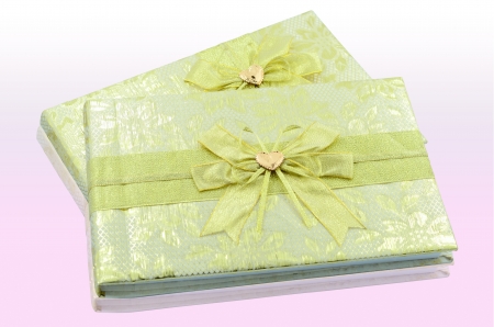 Register book of wedding on the pink tableの写真素材