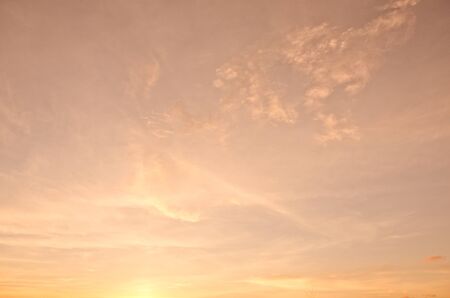 Golden sunset background for printing designの写真素材