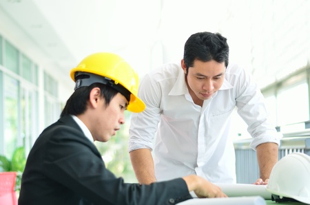Two engineers are planning seriousの写真素材