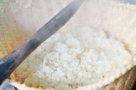 original rice cooking with steamed in asian countrysideの写真素材