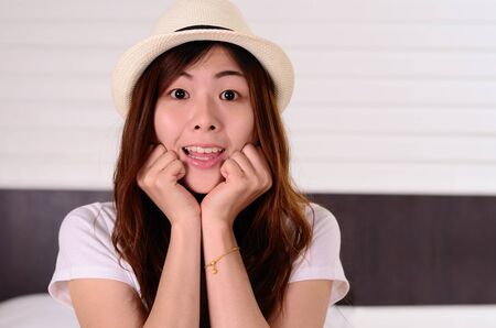 Close up Asian woman teenager have a surprised face emotionの写真素材
