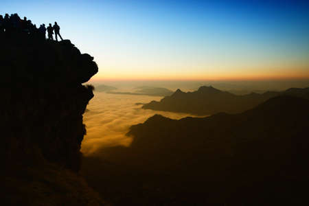 Sunrise scene with the peak and cloudscape at Phu chi fa in Chiangrai,Thailand の写真素材