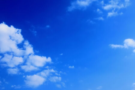 blue sky background with tiny clouds の写真素材