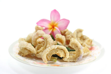 Fried Pork Skin on white の写真素材