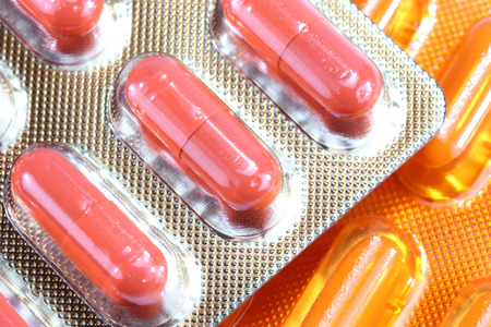 Pills of capsules in blister pack closeup 