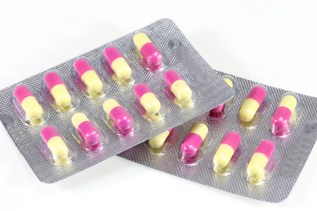 Pills of capsules in blister pack closeup 