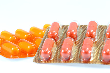 Pills of capsules in blister pack closeup 